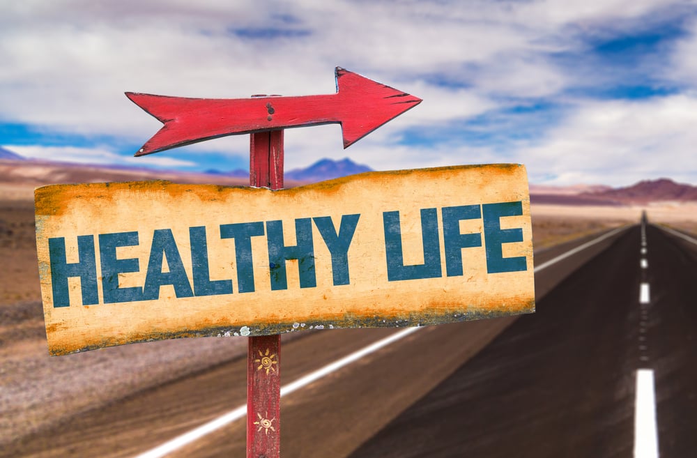 Healthy Life sign with road background-1